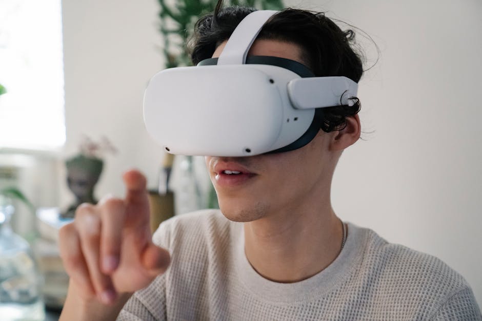 Close-up of a young man immersed in a virtual reality experience indoors using a VR headset.